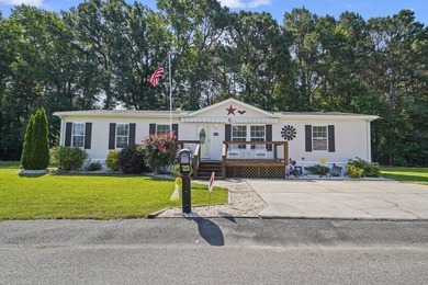 Three-bedroom, two-bathroom, single-story manufactured home with - photo 1