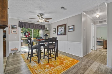 Three-bedroom, two-bathroom, single-story manufactured home with - photo 7