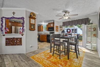 Three-bedroom, two-bathroom, single-story manufactured home with - photo 8