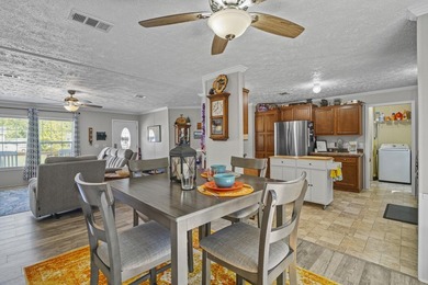 Three-bedroom, two-bathroom, single-story manufactured home with - photo 9