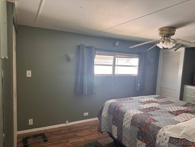 This well-maintained double-wide home offers comfortable living - photo 11