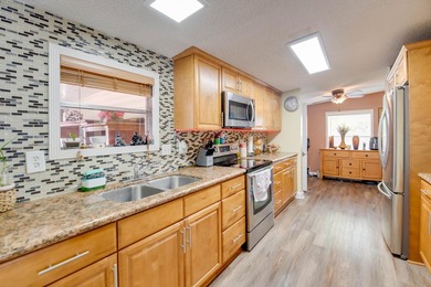 Spacious 4-Bedroom, 3-Bath Home on Expansive Lot with Fruit - photo 8