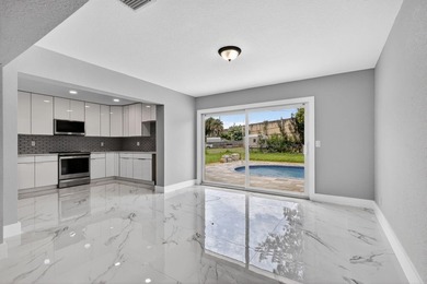 Welcome to this charming single-story residence located in Lake - photo 11