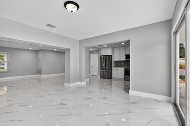 Welcome to this charming single-story residence located in Lake - photo 12