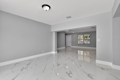 Welcome to this charming single-story residence located in Lake - photo 13