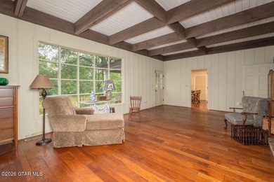 Set on 4.04 acres with pond frontage, this custom-built - photo 14