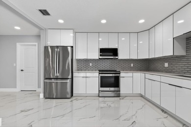 Welcome to this charming single-story residence located in Lake - photo 14