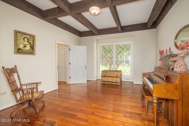 Set on 4.04 acres with pond frontage, this custom-built - photo 15