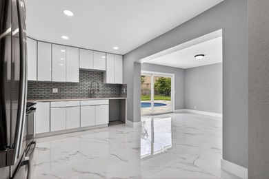 Welcome to this charming single-story residence located in Lake - photo 15