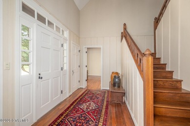 Set on 4.04 acres with pond frontage, this custom-built - photo 16