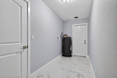 Welcome to this charming single-story residence located in Lake - photo 19