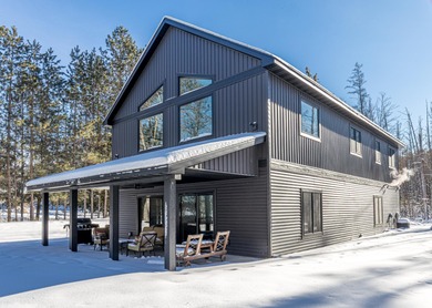 BRAND NEW construction home on Lake Shishebogama! This quality - Lake Home For Sale in Minocqua, Wisconsin