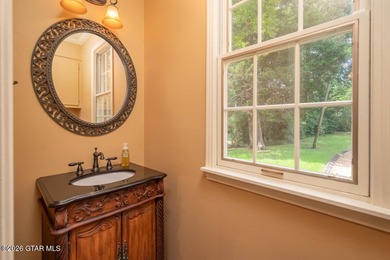 Set on 4.04 acres with pond frontage, this custom-built - photo 21