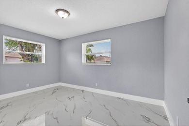 Welcome to this charming single-story residence located in Lake - photo 21