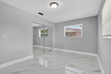 Welcome to this charming single-story residence located in Lake - photo 22