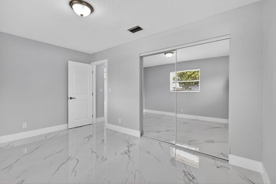 Welcome to this charming single-story residence located in Lake - photo 23