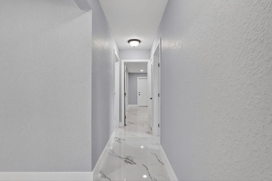 Welcome to this charming single-story residence located in Lake - photo 24