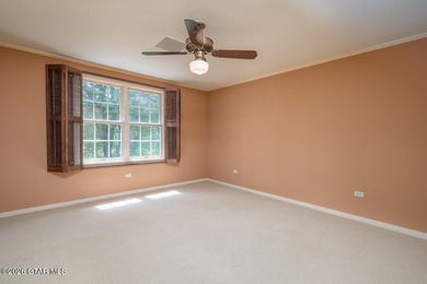 Set on 4.04 acres with pond frontage, this custom-built - photo 25