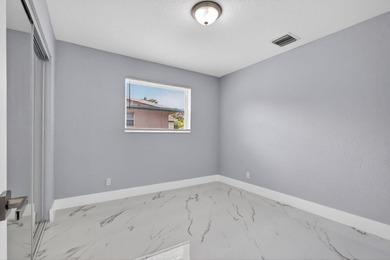 Welcome to this charming single-story residence located in Lake - photo 25