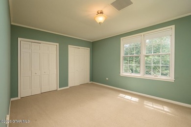 Set on 4.04 acres with pond frontage, this custom-built - photo 29