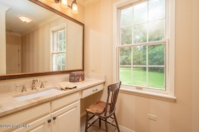 Set on 4.04 acres with pond frontage, this custom-built - photo 33