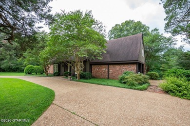 Set on 4.04 acres with pond frontage, this custom-built - photo 37