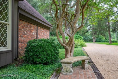 Set on 4.04 acres with pond frontage, this custom-built - photo 39