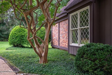 Set on 4.04 acres with pond frontage, this custom-built - photo 40