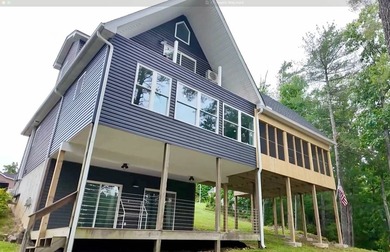 Lake Malone!! Don't miss this stunning lakefront home located on - photo 1