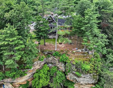 Lake Malone!! Don't miss this stunning lakefront home located on - photo 2