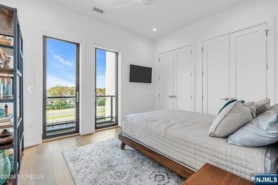 Panoramic ocean views await in this one-of-a-kind, 4-level - photo 3