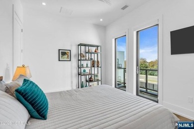 Panoramic ocean views await in this one-of-a-kind, 4-level - photo 4