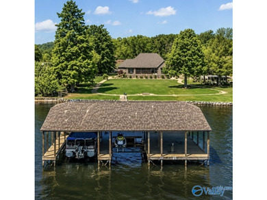 The best in waterfront living, this impressive lakefront home on - photo 1