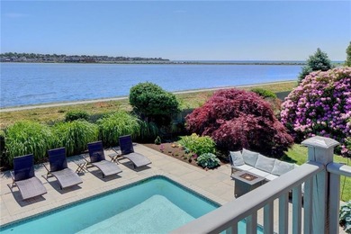 Nestled in a picturesque setting overlooking Easton's Pond, this - photo 1