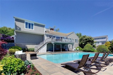 Nestled in a picturesque setting overlooking Easton's Pond, this - photo 2