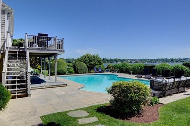 Nestled in a picturesque setting overlooking Easton's Pond, this - photo 10