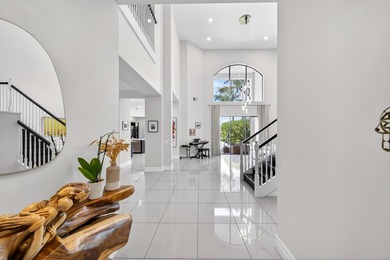 Welcome to this stunning Somerset model pool home on a serene - photo 4