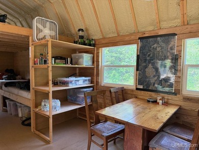 This 240-acre property is located within the Ottawa National - photo 8