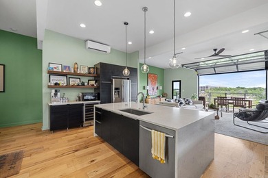 Perched above The Capitol, this contemporary retreat is designed - photo 11