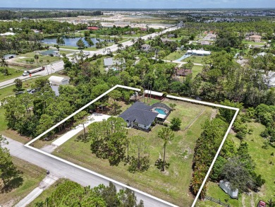 (private lake, pond, creek) Home For Sale in The Acreage Florida