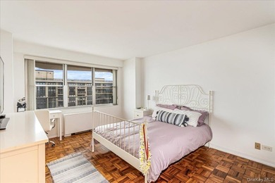 Experience luxury high-rise living in this stunning two-bedroom - photo 15