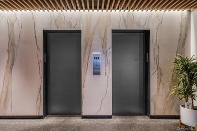 Experience luxury high-rise living in this stunning two-bedroom - photo 20