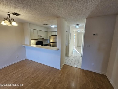 Welcome home to this beautiful two-story waterfront condo. The