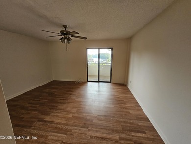 Welcome home to this beautiful two-story waterfront condo. The