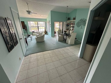Discover this beautifully maintained condominium in the heart of - photo 3