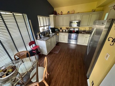 Discover this beautifully maintained condominium in the heart of - photo 8