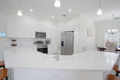 This stunning pool home has it all! Gorgeous plank tile flooring - photo 3
