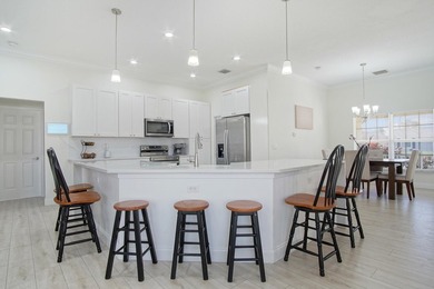This stunning pool home has it all! Gorgeous plank tile flooring - photo 4