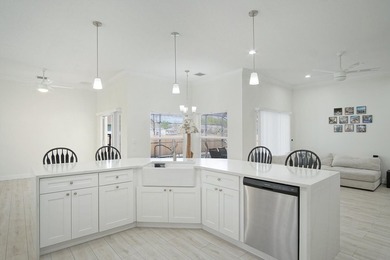 This stunning pool home has it all! Gorgeous plank tile flooring - photo 5