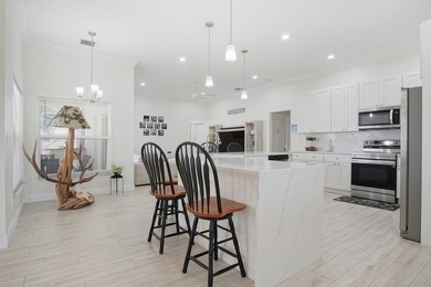 This stunning pool home has it all! Gorgeous plank tile flooring - photo 7